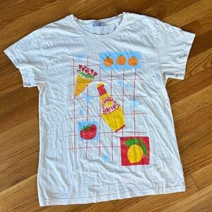 Anthropologie Letluv graphic tee with a "Summer Day" or "Juice Pod" design.